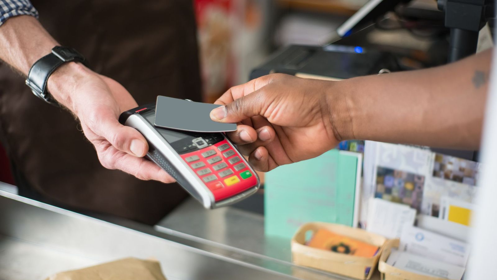 Contactless card payment at a counter — high-risk payment gateways for CBD and vape UK